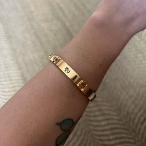 Tory Burch gold stud hinge bangle